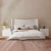 Winged upholstered linen bed
