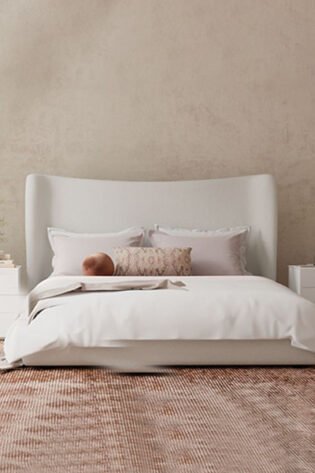 Winged upholstered linen bed